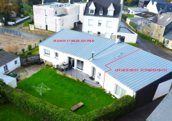 LOPERHET : Maison de plain pied T7 et un T2 indépendant avec un grand garage et un atelier au coeur du bourg